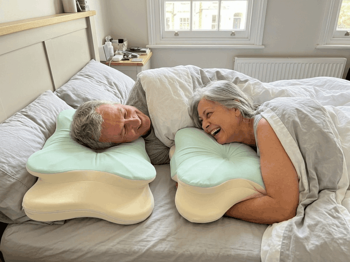 Couple in bed, each on a NattieSide
